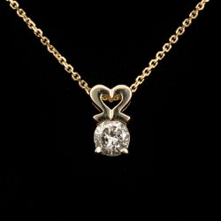 14ky round diamond w/gold heart pendant on chain, D=.20 cttw.-$500.00