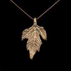 10KY leaf pendant on chain-$200.00