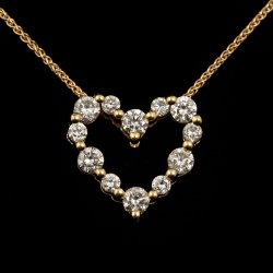 18ky diamond heart pendant on 14ky chain-$600.00
